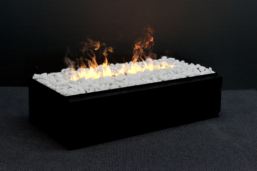 The Cassette L Pebbles is part of the Dimplex Cassette range, known for its unique, free floating flame and smoke effect, but now supplied with a decoration of white pebble stones. Easy to install in bespoke interior projects, only a normal electric socket is required.